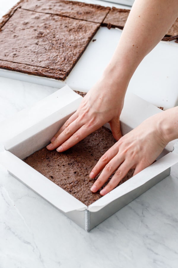 How to make brownie ice cream sandwiches: press first layer into the bottom of the pan.