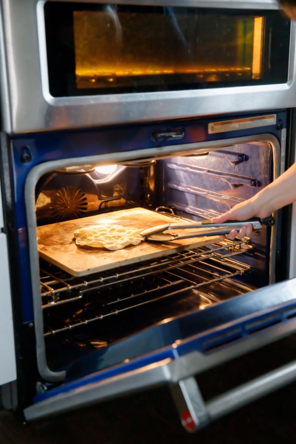 Flip the cracker mid-way through baking when the surface is bubbly.