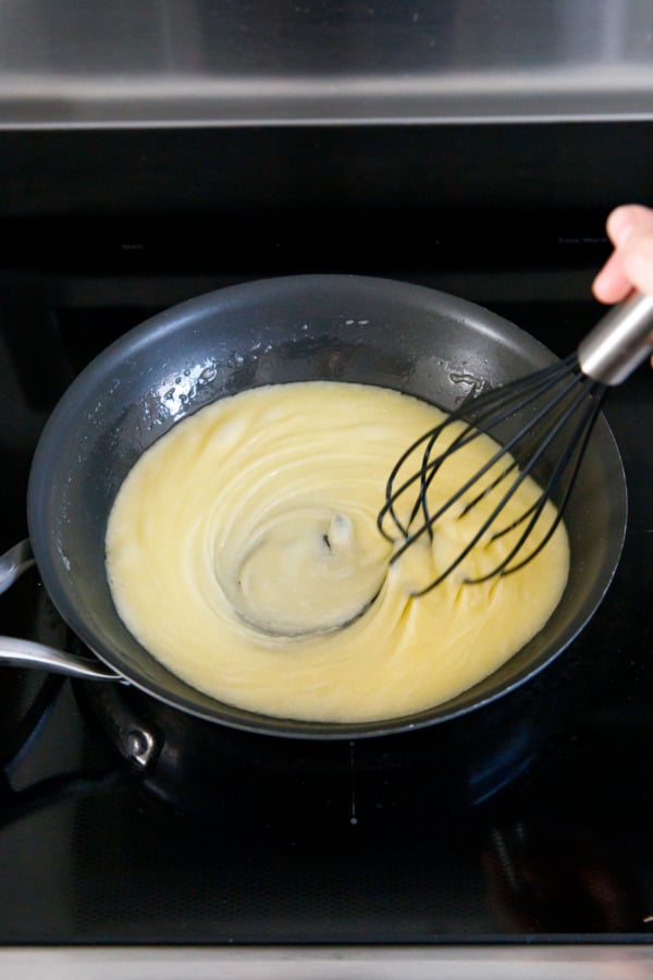 Florentine cookie batter in a skillet, the butter and sugar will emulsify into a creamy mixture after a few minutes of whisking.