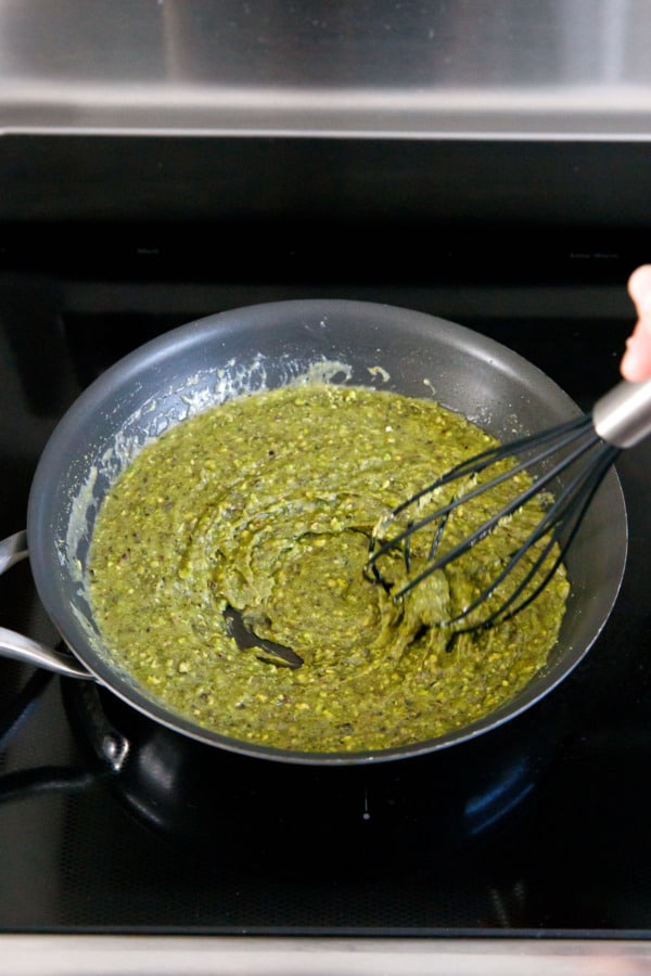 After the pistachio flour has been incorporate the batter will be smooth and paste-like.