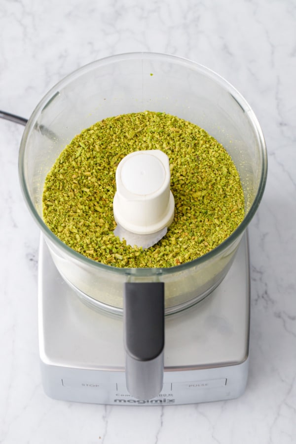 Finely ground pistachios (aka pistachio flour) in a food processor.