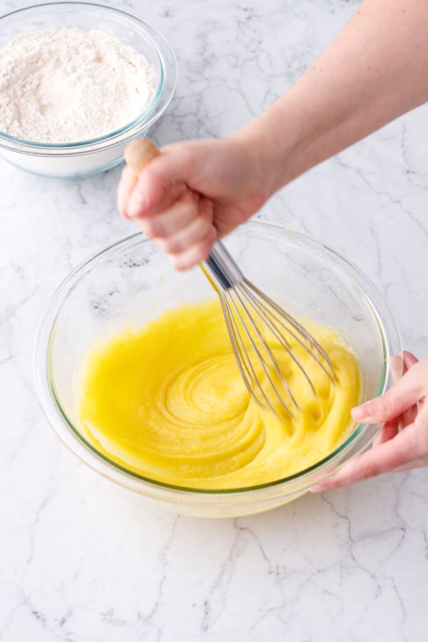 The texture of the batter after whisking in the eggs should be completely smooth.