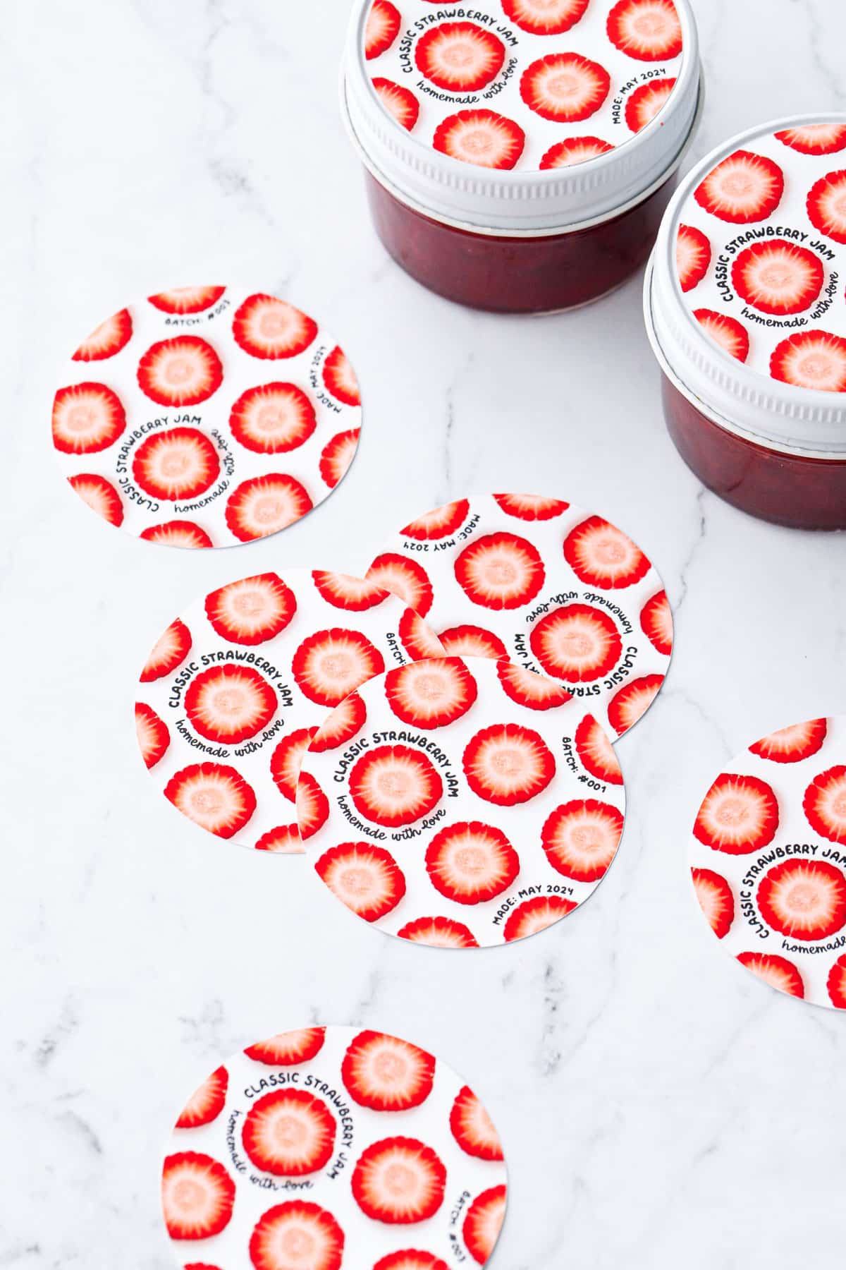 Classic Strawberry Jam in glass jars with cute printable labels.