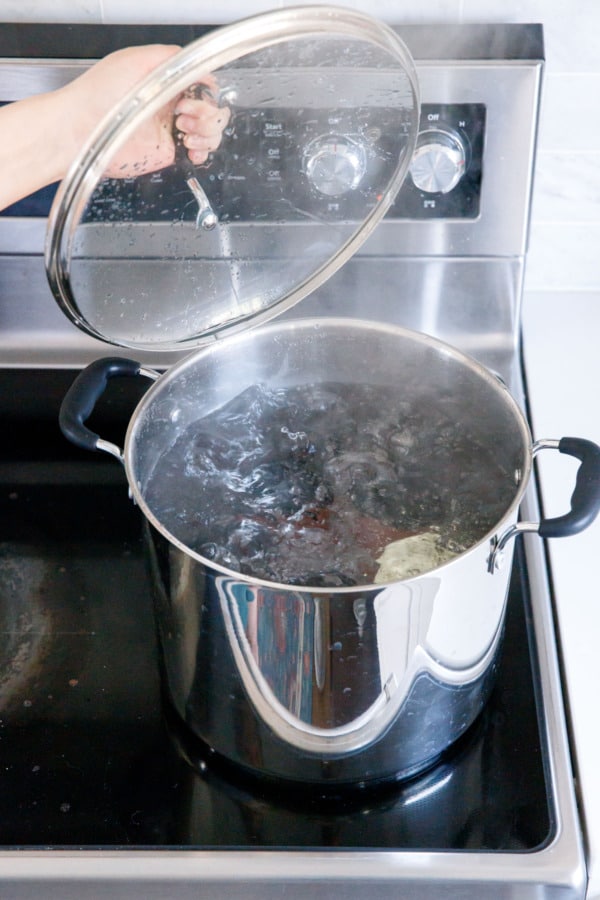 Canning pot with fully boiling water.