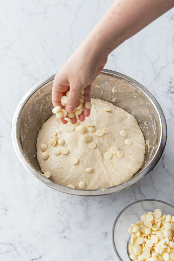 During the last set of stretch and folds, add the white chocolate pieces.